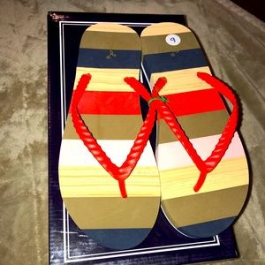 New woman’s flip flops.